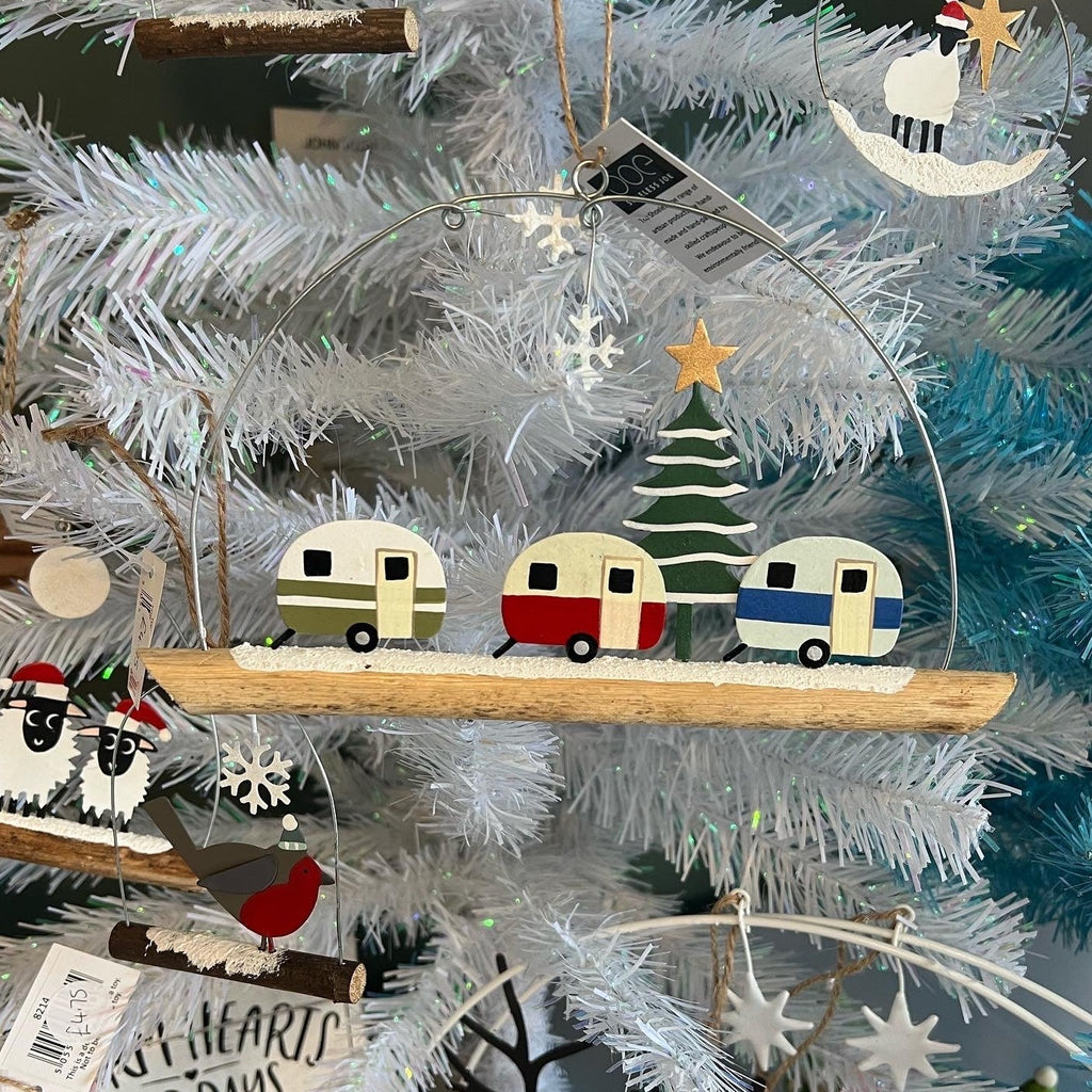 three christmas caravans on a twig hanging christmas decoration