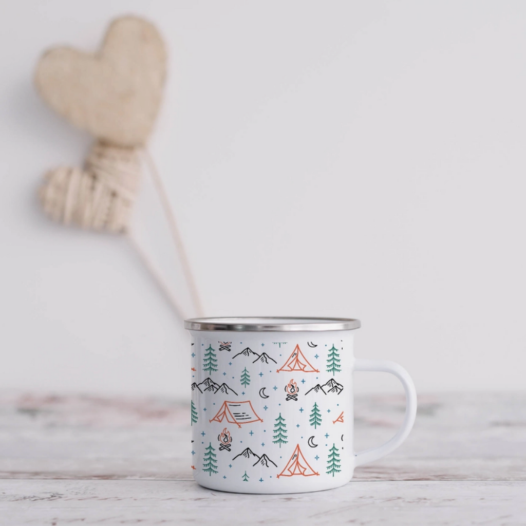 Camping theme enamel mug with tents fir trees campfires and mountains.